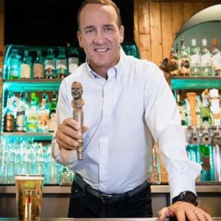 Omaha! 🏈🍔 Flashback Friday to the time we scored Payton Manning behind the bar slinging beers. What do you think, should we hire him for the season? . . #cherrycricket #paytonmanning #thelegend #broncoscountry #denverbroncos #burgersandbeer